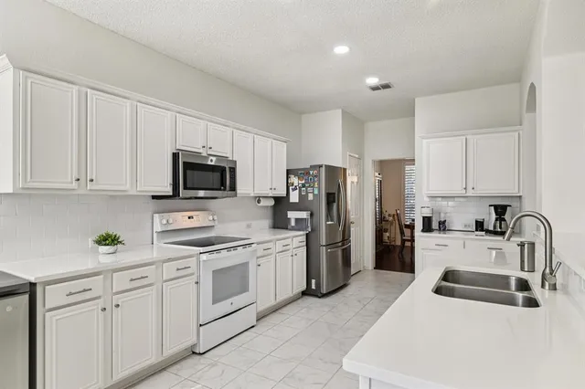 $410,000 | 5118 Royal Bay Drive, Rowlett, TX 75089