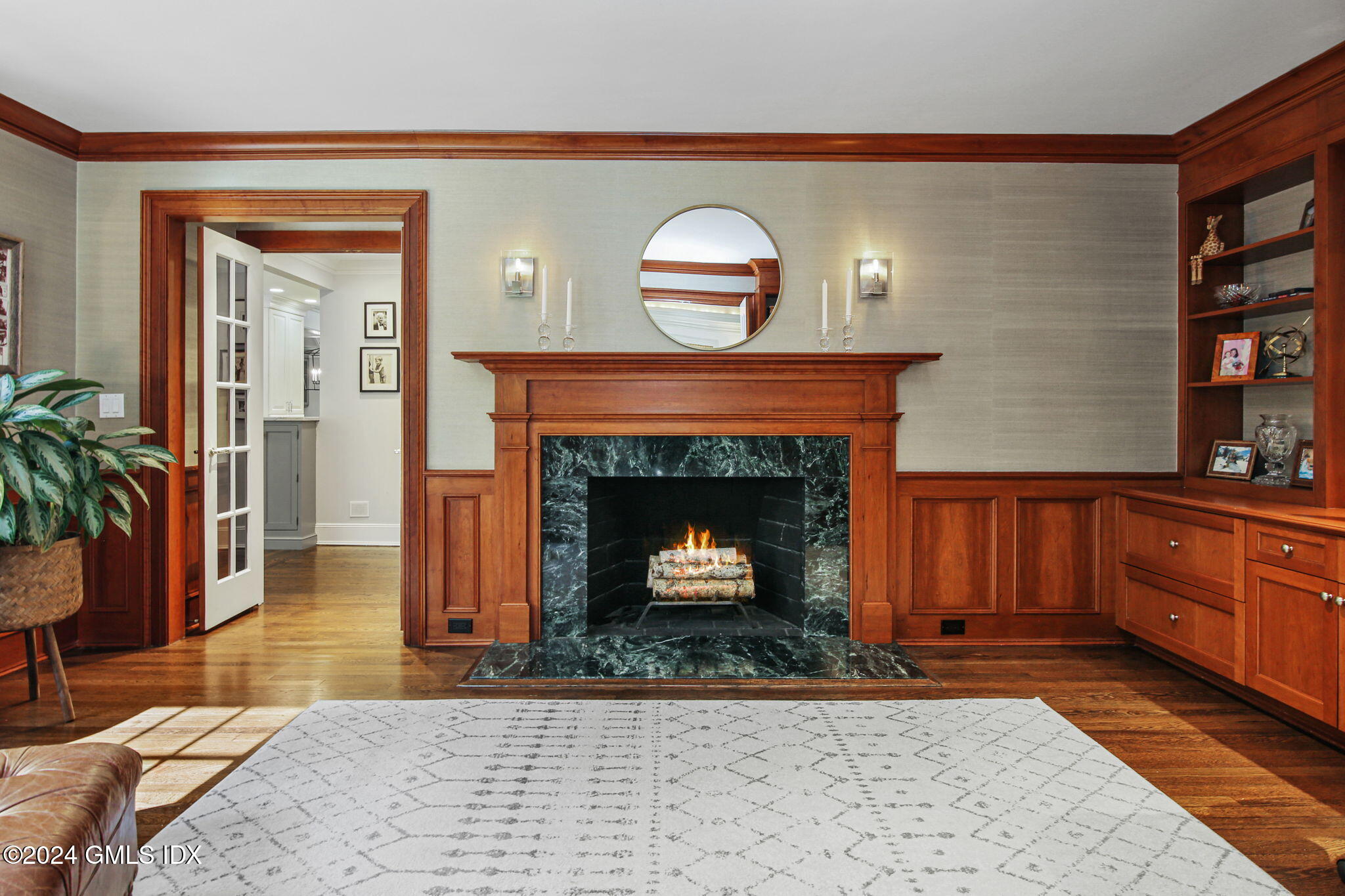 49 Grosset Road Riverside, CT 06878 - Photo 11 of 41 a view of a livingroom with a fireplace and window