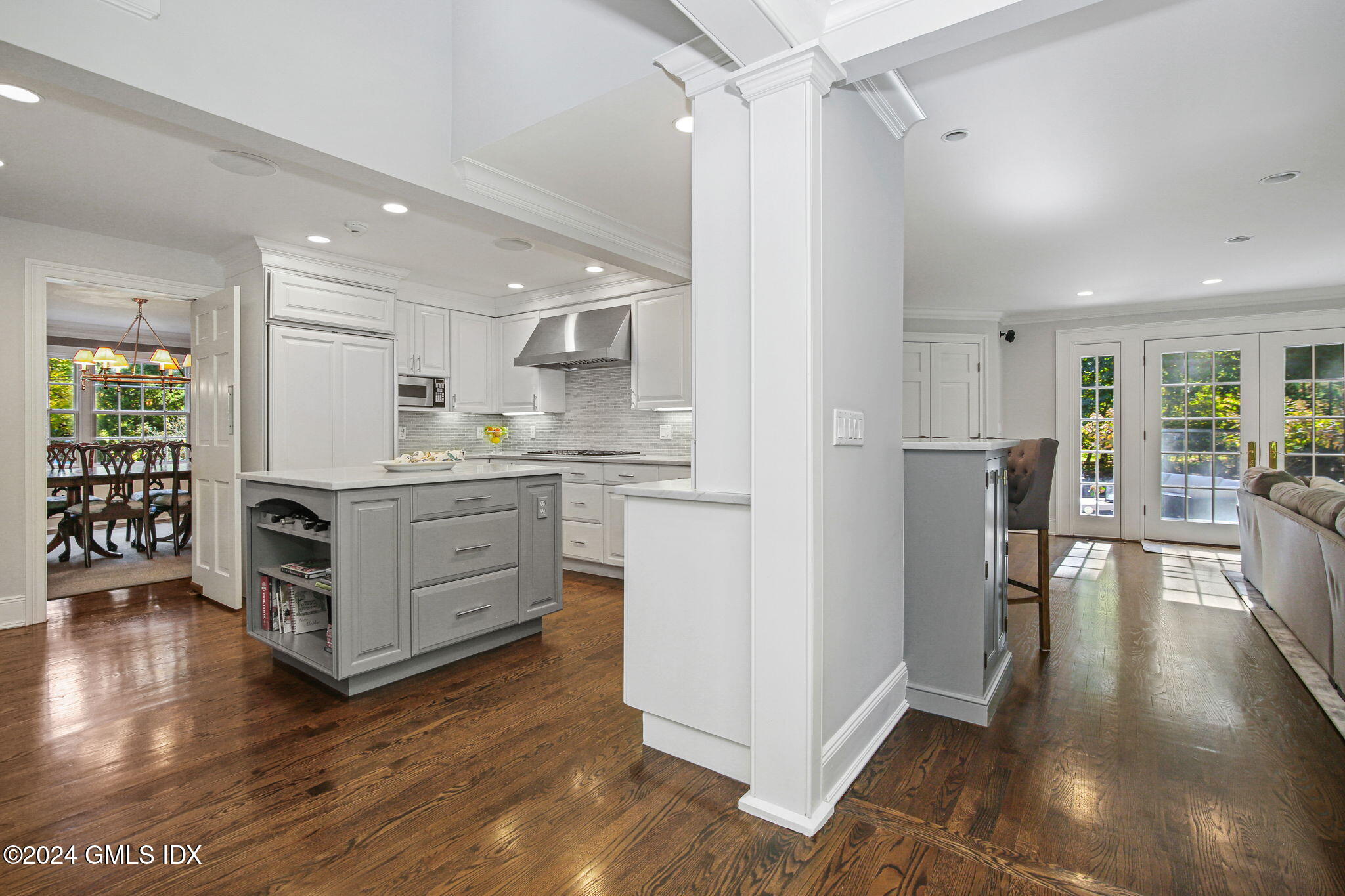 49 Grosset Road Riverside, CT 06878 - Photo 14 of 41 a kitchen with stainless steel appliances a refrigerator sink and cabinets
