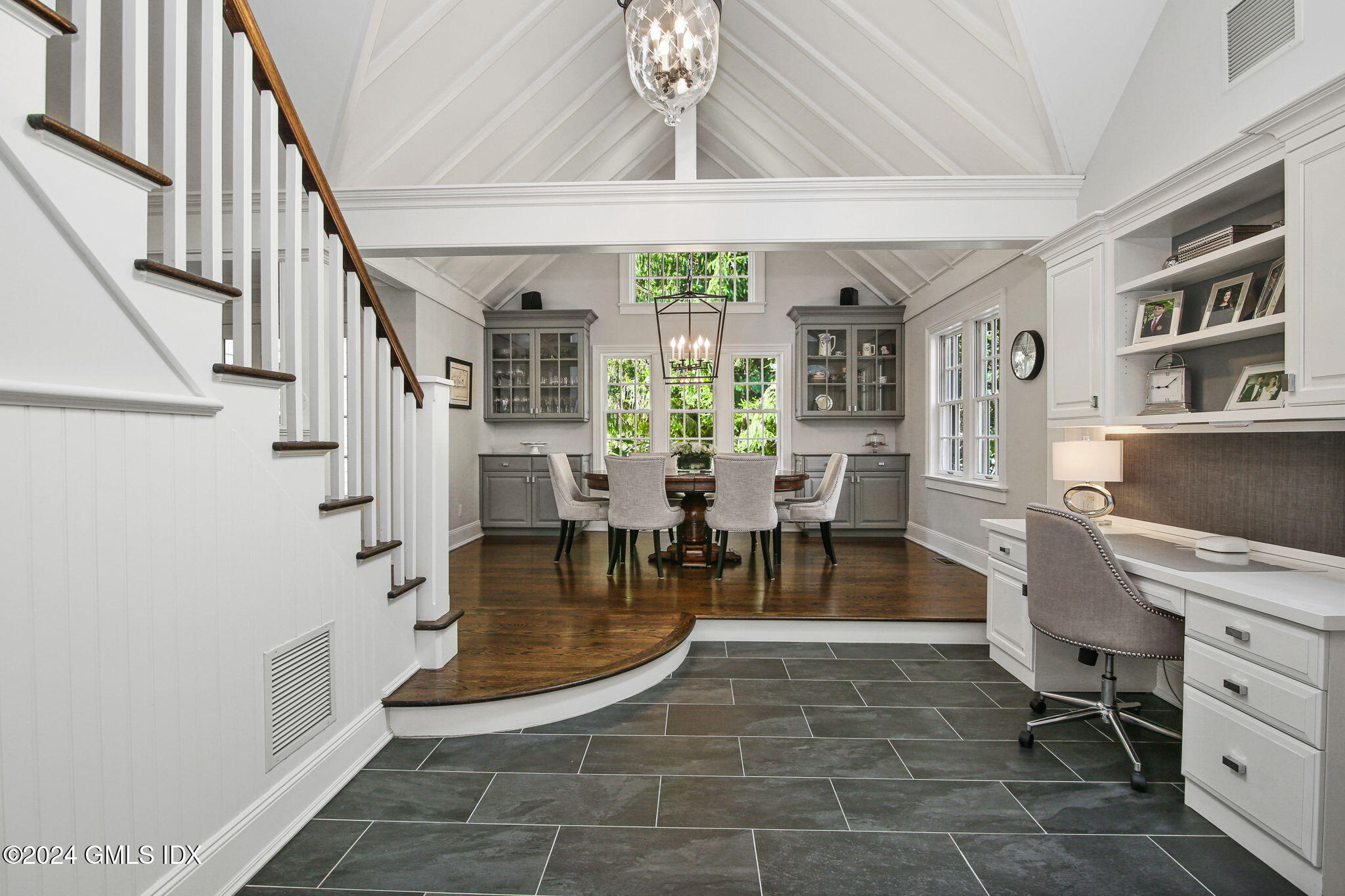 49 Grosset Road Riverside, CT 06878 - Photo 22 of 41 a view of a dining room with furniture a rug and wooden floor
