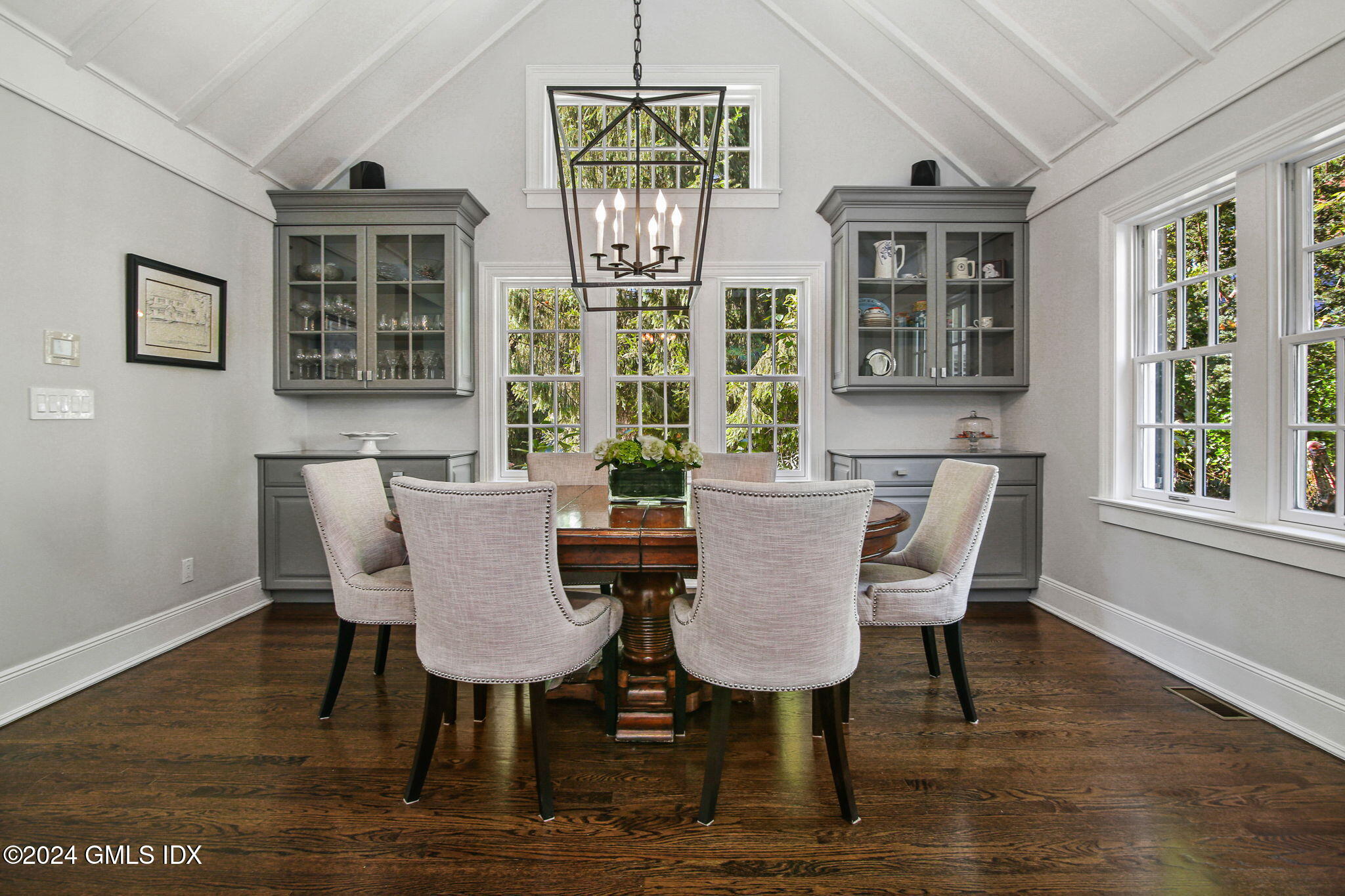 49 Grosset Road Riverside, CT 06878 - Photo 24 of 41 a view of a dining room with furniture wooden floor and chandelier