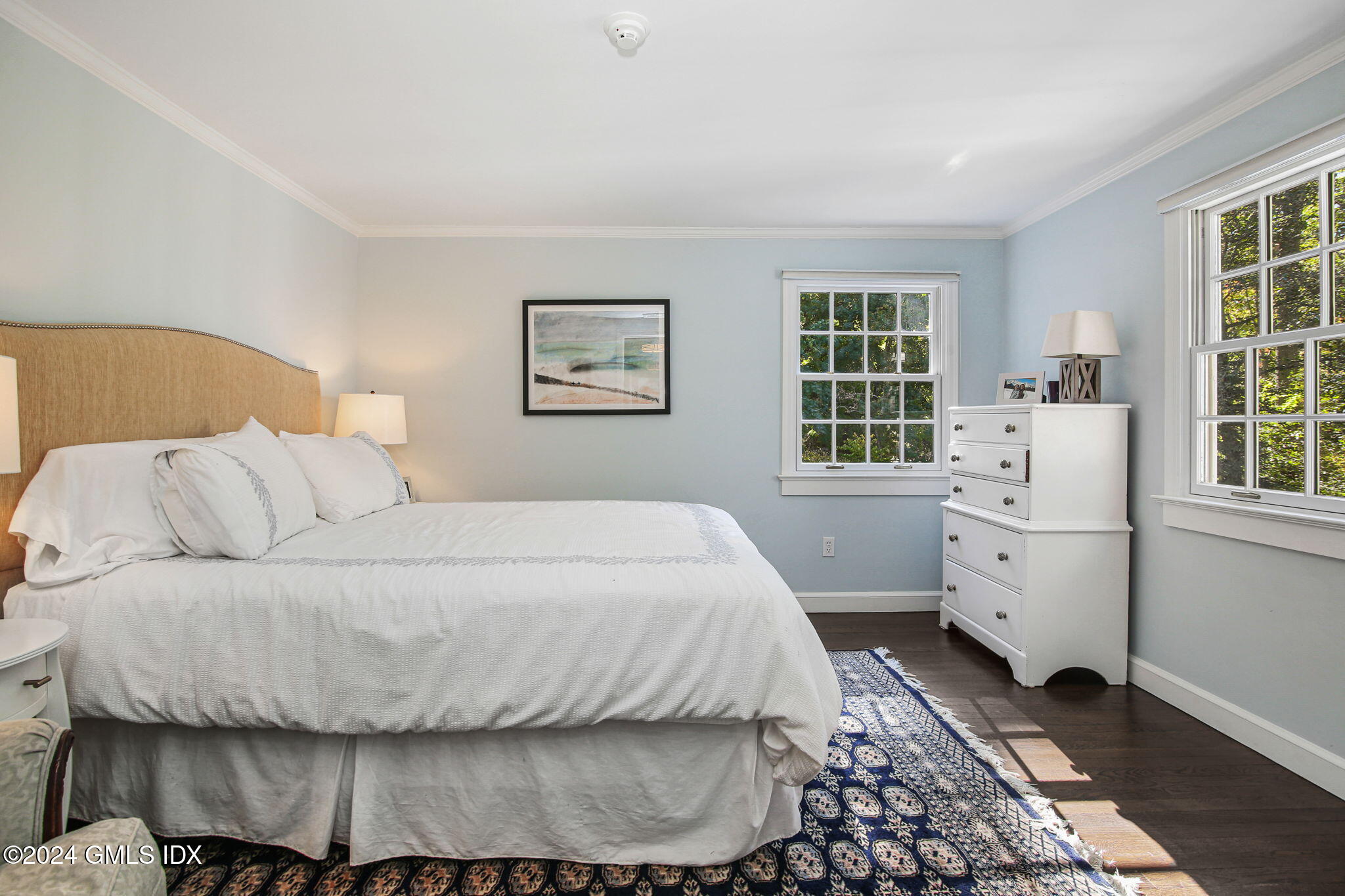 49 Grosset Road Riverside, CT 06878 - Photo 30 of 41 a bedroom with a bed and a window