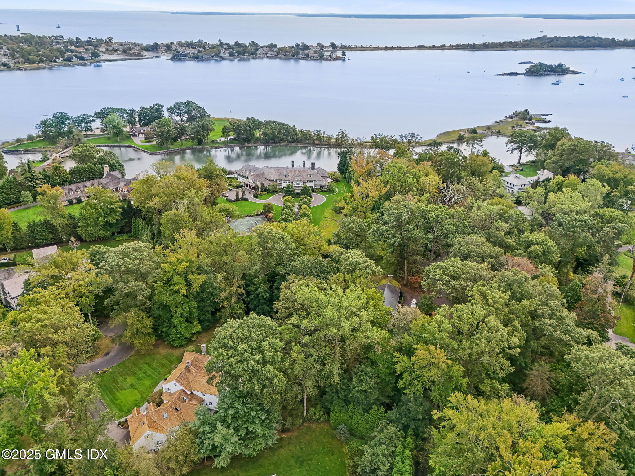 49 Grosset Road Riverside, CT 06878 - Photo 3 of 41 a view of a lake with a city view