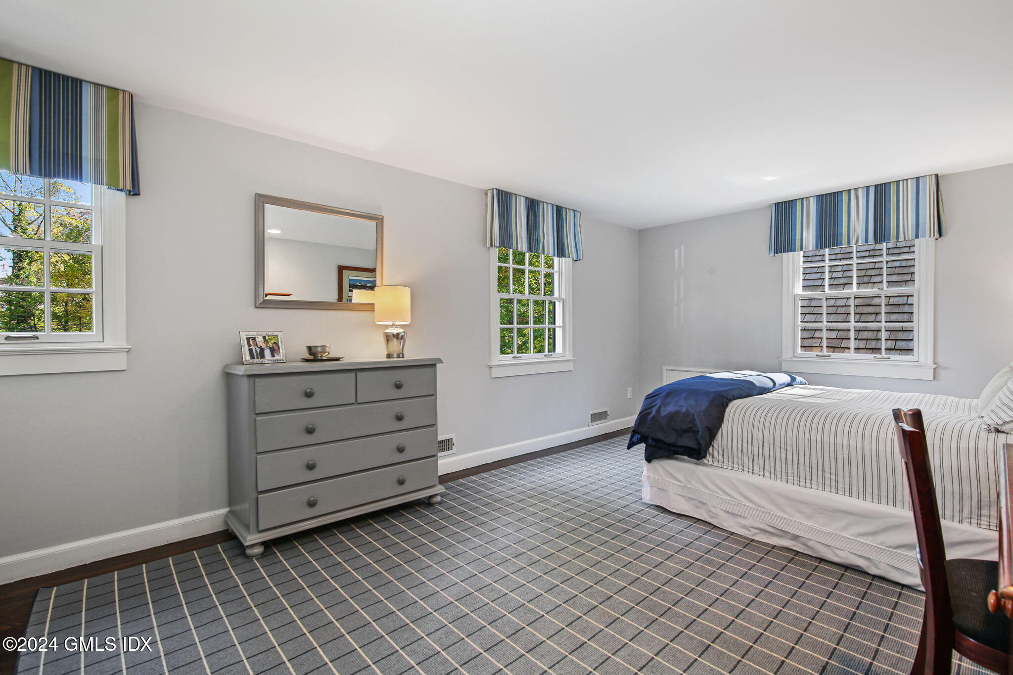 49 Grosset Road Riverside, CT 06878 - Photo 33 of 41 a bedroom with a bed and a window