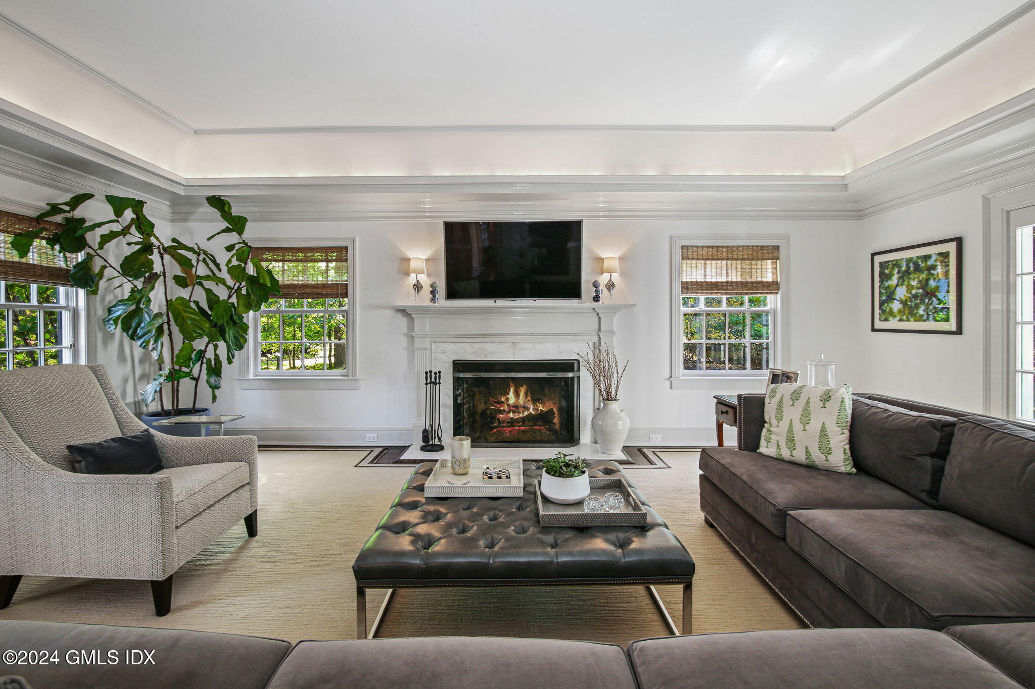 49 Grosset Road Riverside, CT 06878 - Photo 7 of 41 a living room with furniture and a fireplace