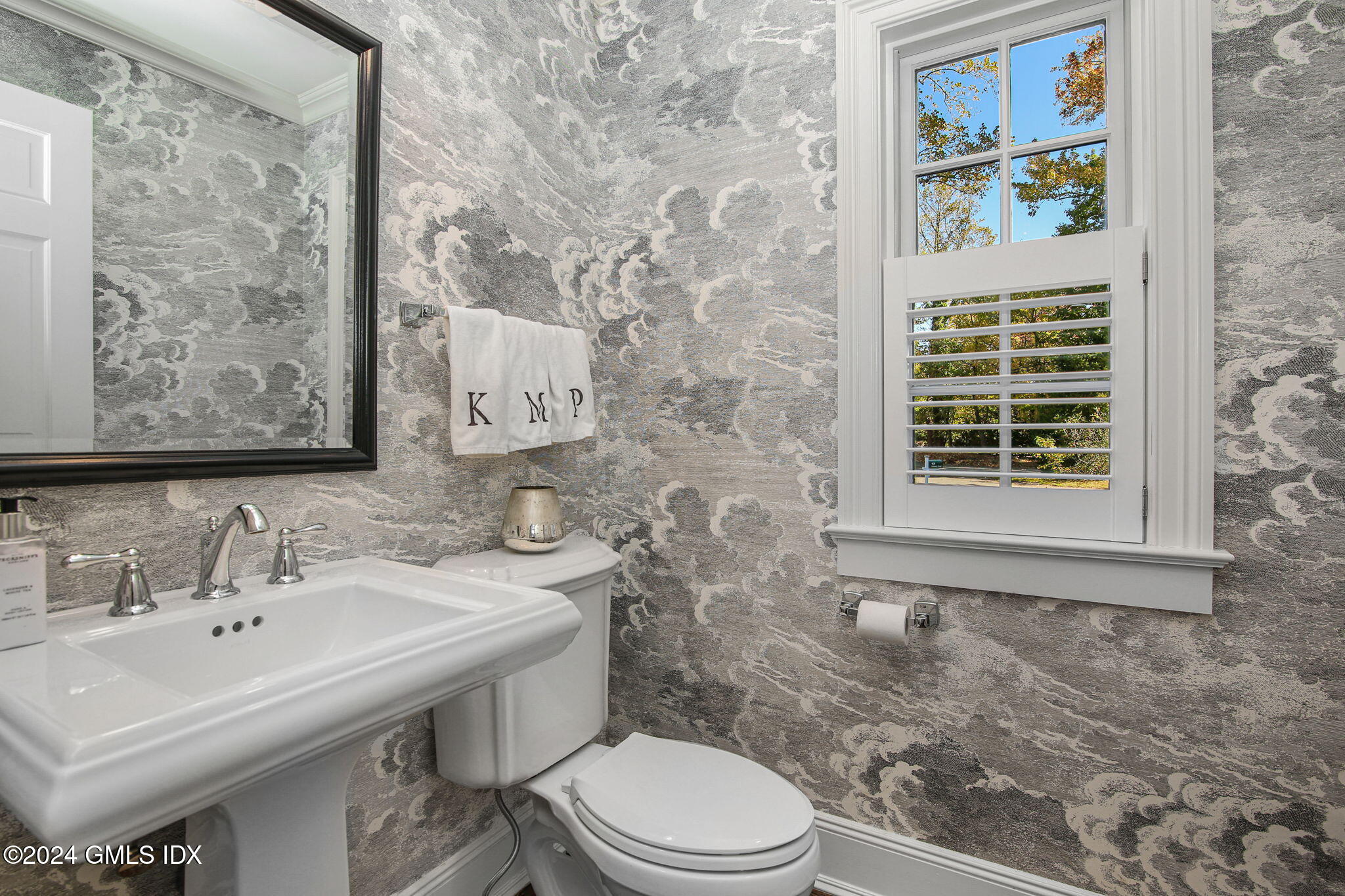 49 Grosset Road Riverside, CT 06878 - Photo 10 of 41 a bathroom with a sink a toilet and mirror