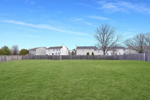 a house with garden in front of it