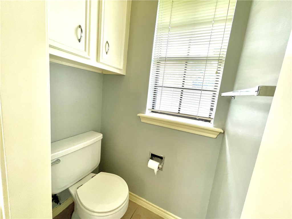 4508 Kensington Road Bryan, TX 77802 - Photo 16 of 25 Bathroom featuring tile patterned floors and toilet