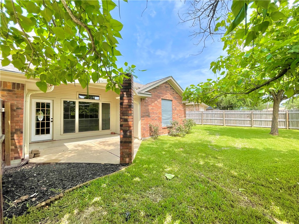 4508 Kensington Road Bryan, TX 77802 - Photo 22 of 25 View of yard with a patio area