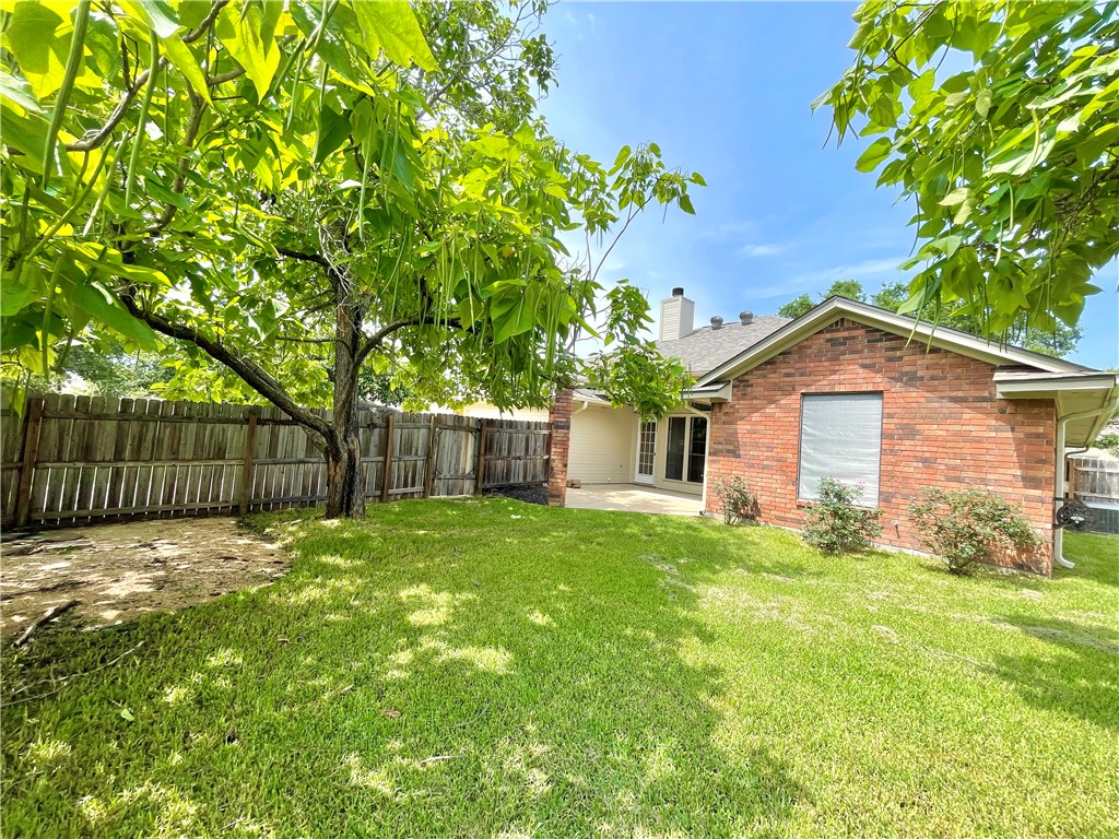 4508 Kensington Road Bryan, TX 77802 - Photo 23 of 25 View of yard featuring a patio