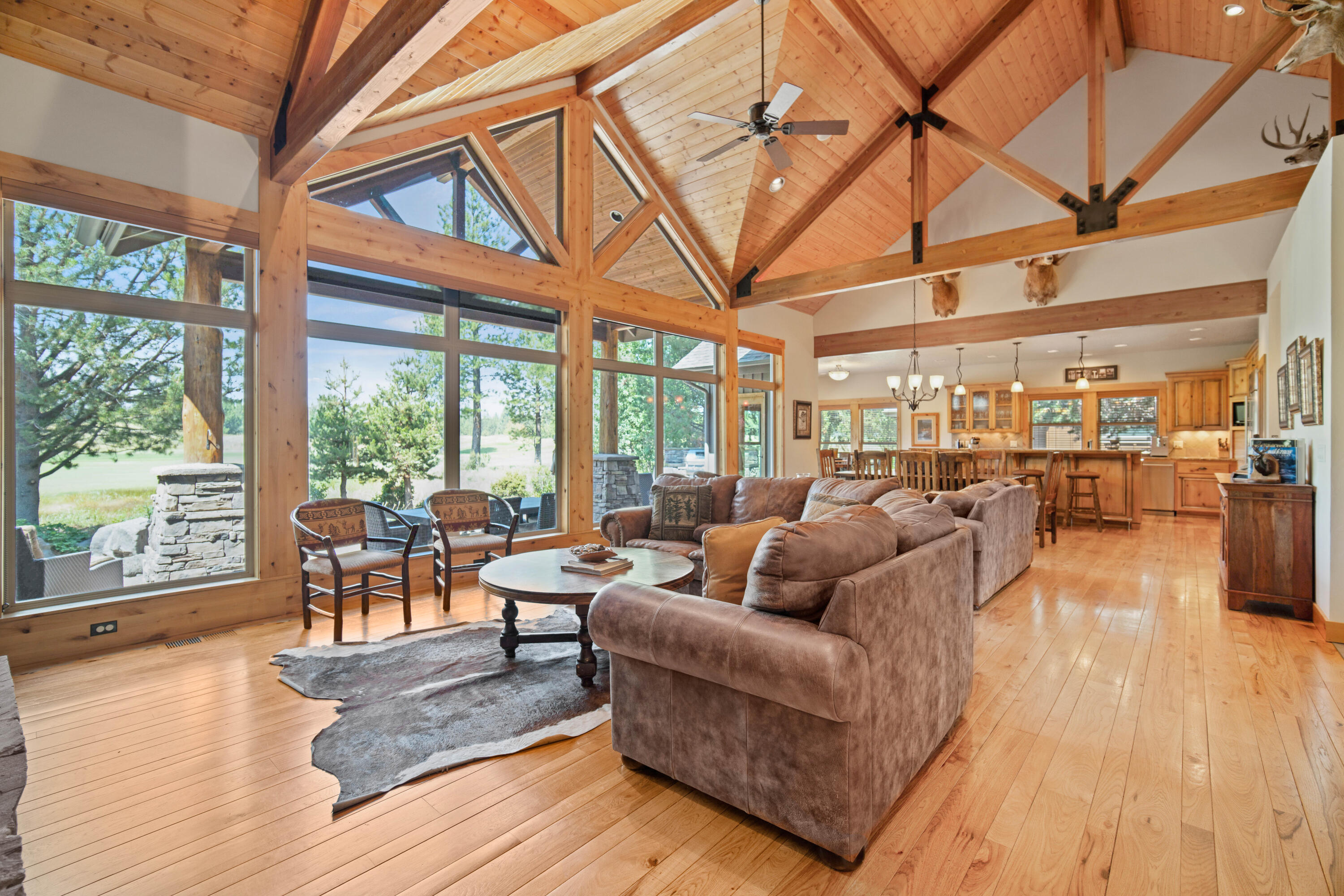 56689 Dancing Rock Loop Bend, OR 97707 - Photo 5 of 51 a living room with furniture and a large window