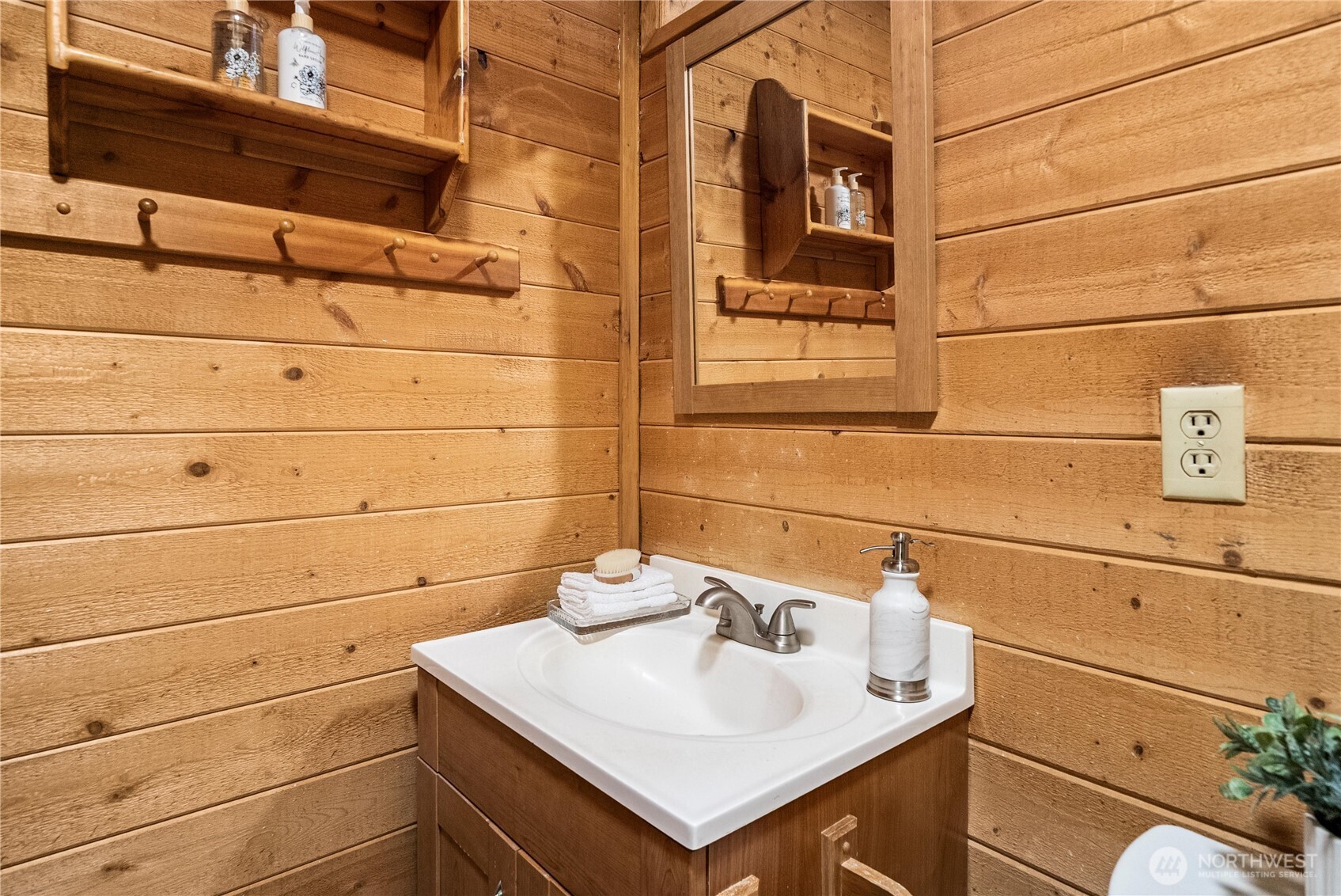 4692 Northeast Lincoln Road Poulsbo, WA 98370 - Photo 14 of 22 a bathroom with a sink and vanity
