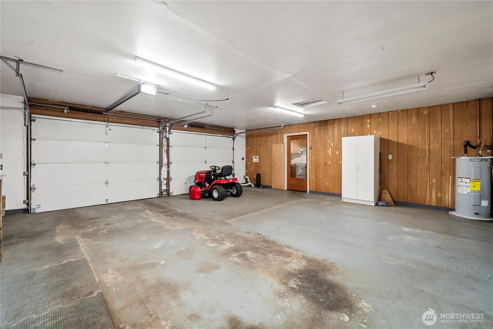 4692 Northeast Lincoln Road Poulsbo, WA 98370 - Photo 16 of 22 a view of a room with garage