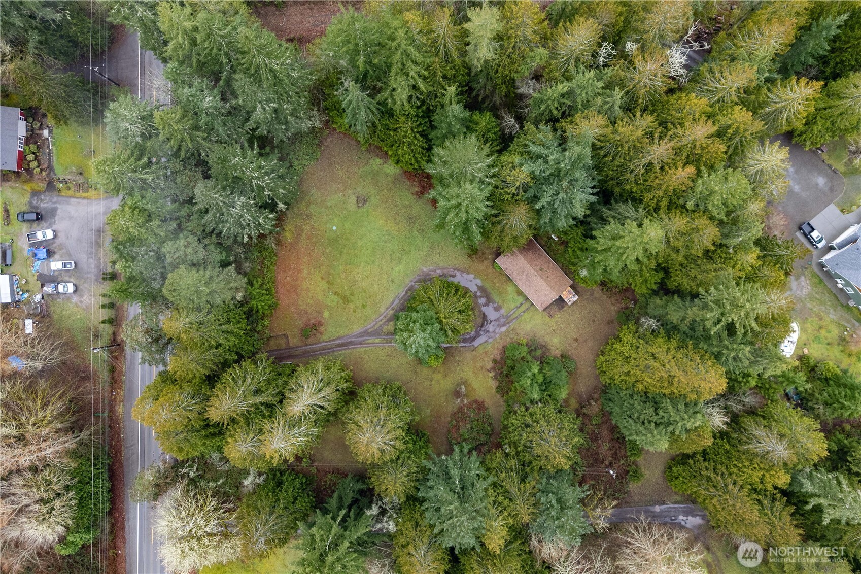4692 Northeast Lincoln Road Poulsbo, WA 98370 - Photo 20 of 22 an aerial view of a house with a yard