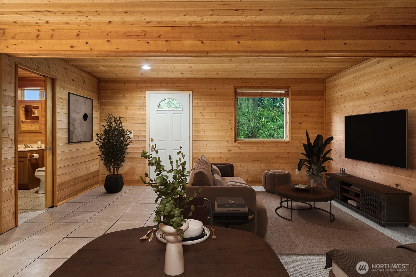 4692 Northeast Lincoln Road Poulsbo, WA 98370 - Photo 7 of 22 a living room with furniture and a flat screen tv