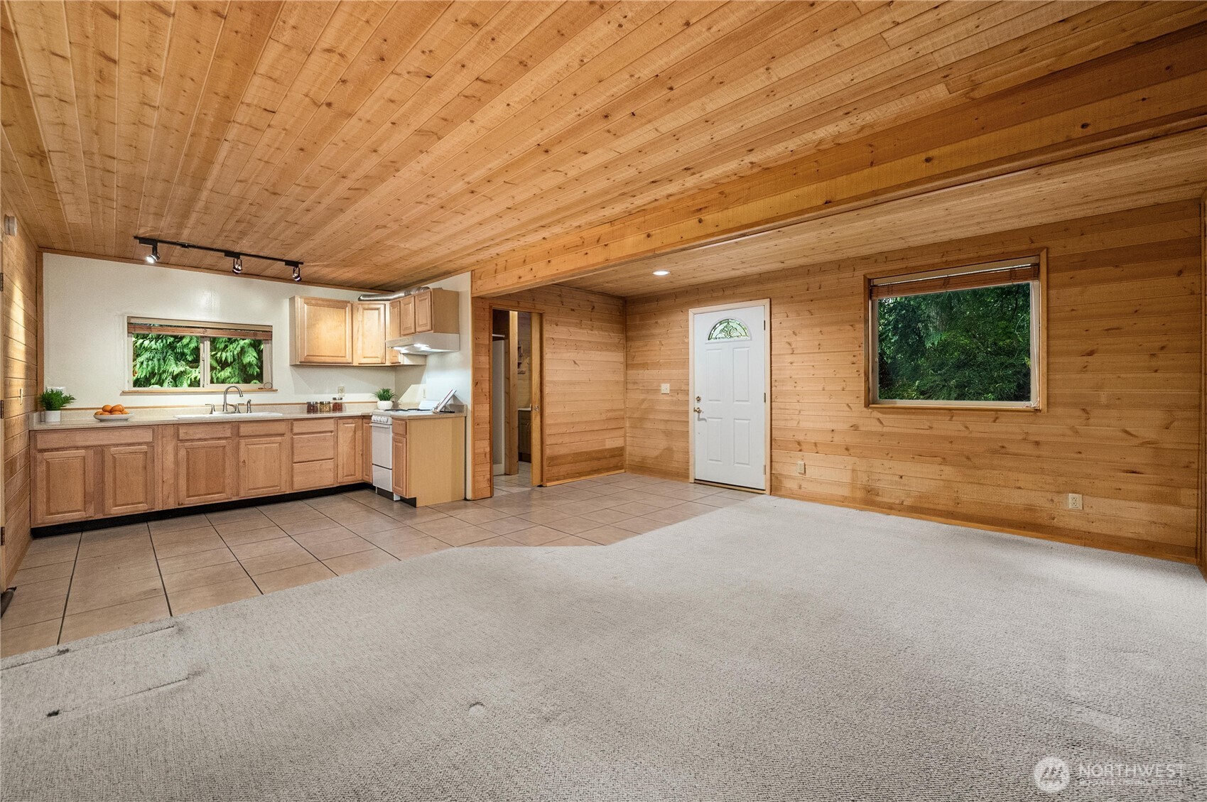 4692 Northeast Lincoln Road Poulsbo, WA 98370 - Photo 8 of 22 a view of a livingroom with a kitchen