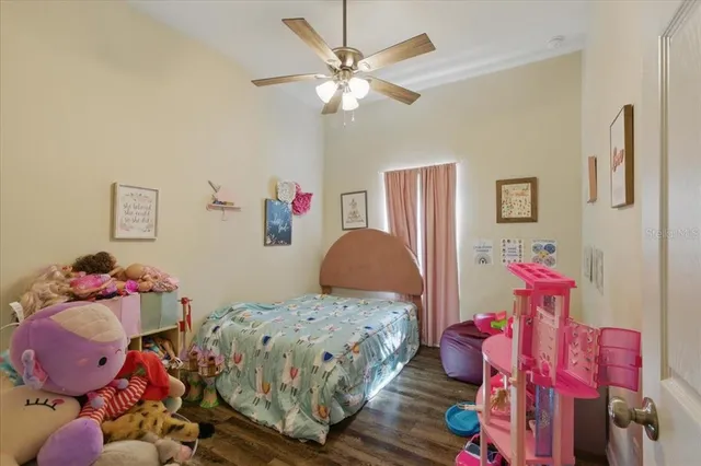 a bedroom with furniture and a bed