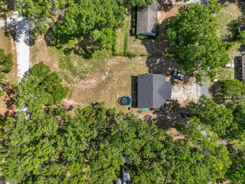 1180 Hough Street Bell, FL 32619 - Photo 33 of 35 an aerial view of a house with a yard