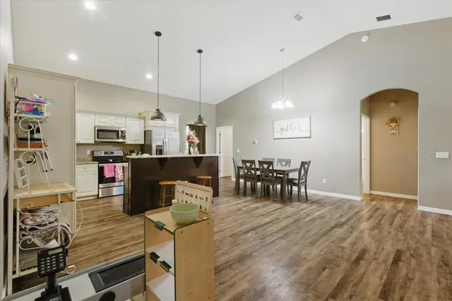 a view of a dining room with furniture