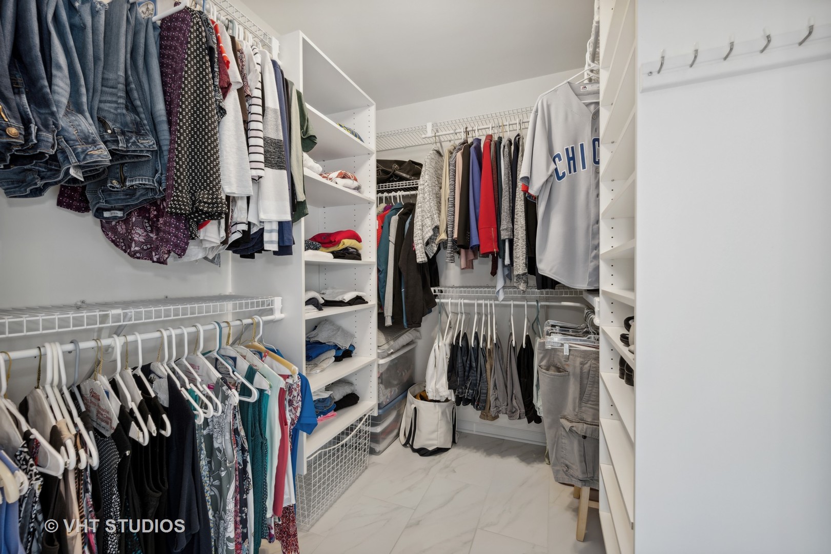 2758 Miller Road Geneva, IL 60134 - Photo 18 of 29 a view of walk in closet with clothes