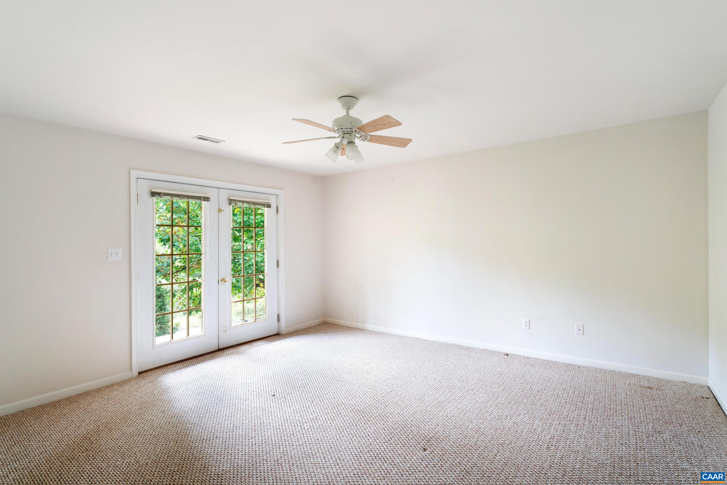 960 Canvas Back Drive Charlottesville, VA 22903 - Photo 40 of 66 an empty room with windows and fan