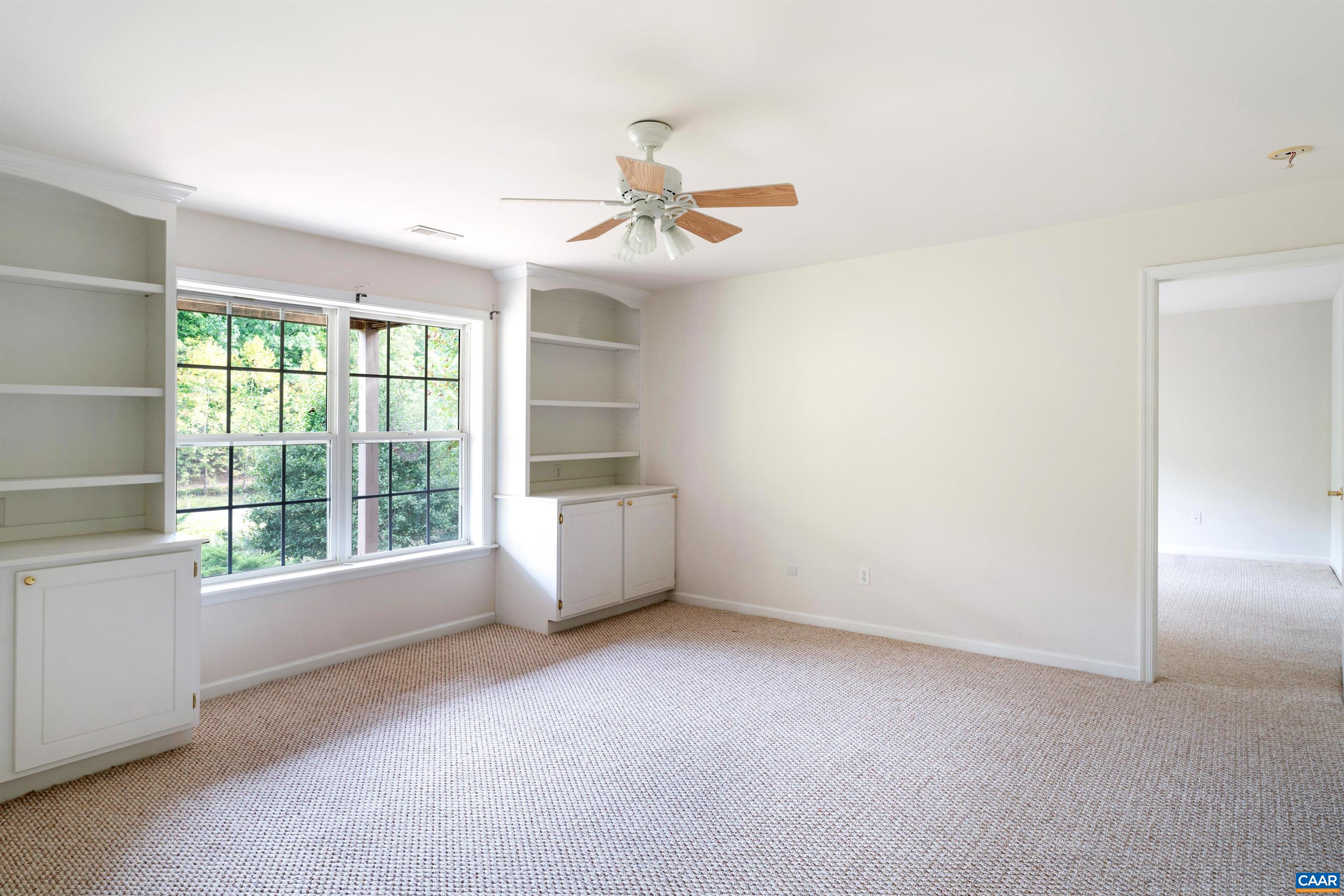 960 Canvas Back Drive Charlottesville, VA 22903 - Photo 45 of 66 an empty room with windows and fan