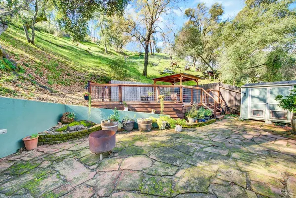 a backyard of a house with seating space