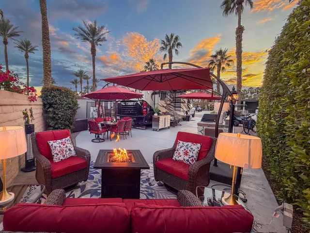 a outdoor living space with furniture and a garden
