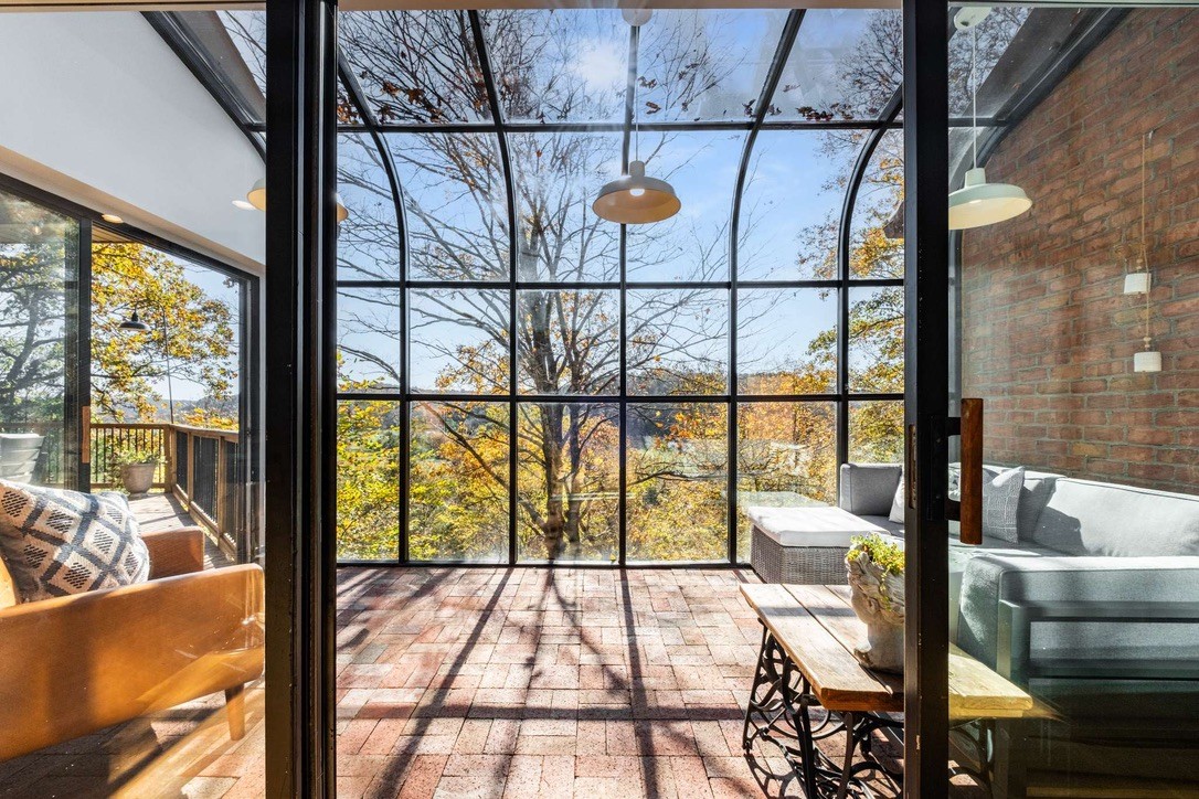 9467 Little East Fork Road Franklin, TN 37064 - Photo 13 of 26 a view of living room with a large window and couch