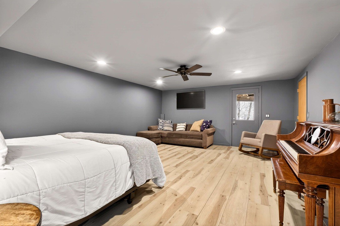 9467 Little East Fork Road Franklin, TN 37064 - Photo 22 of 26 a bedroom with a bed and furniture