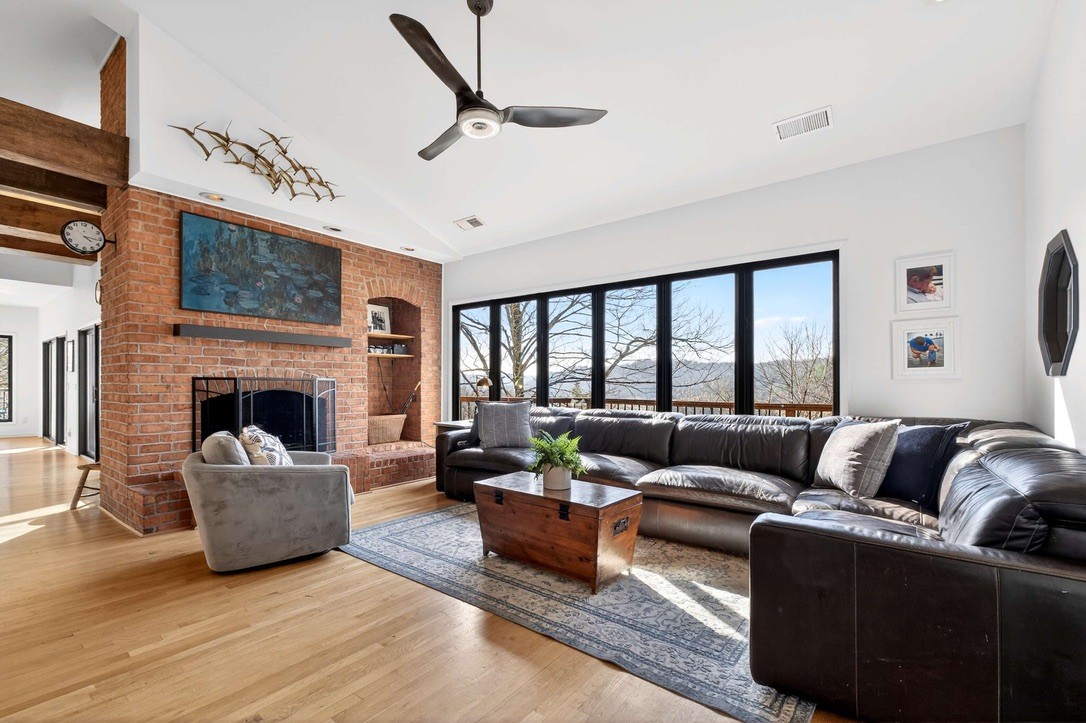 9467 Little East Fork Road Franklin, TN 37064 - Photo 6 of 26 a living room with furniture and a fireplace