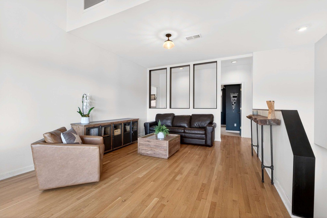 9467 Little East Fork Road Franklin, TN 37064 - Photo 8 of 26 a living room with furniture and wooden floor