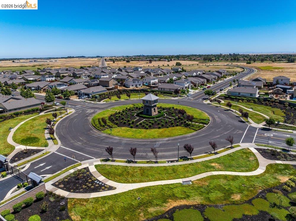 4347 Canada Way Rio Vista, CA 94571 - Photo 40 of 41 Expansive community featuring a central roundabout with a decorative tower and landscaped greenery