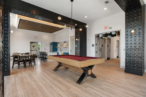 a room with furniture and wooden floor