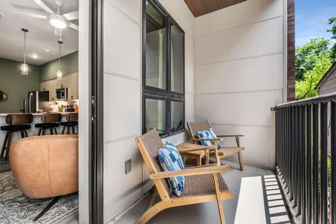 a view of kitchen and dining area with furniture