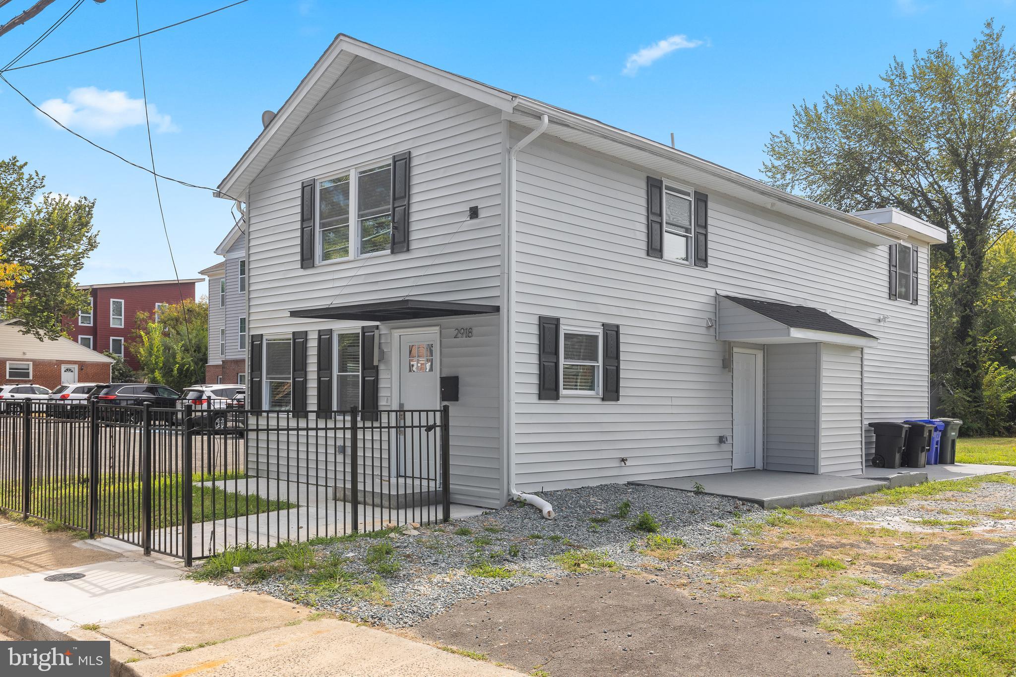 2918 17th Street South Arlington, VA 22204 - Photo 2 of 30 a view of a house with a yard and fence