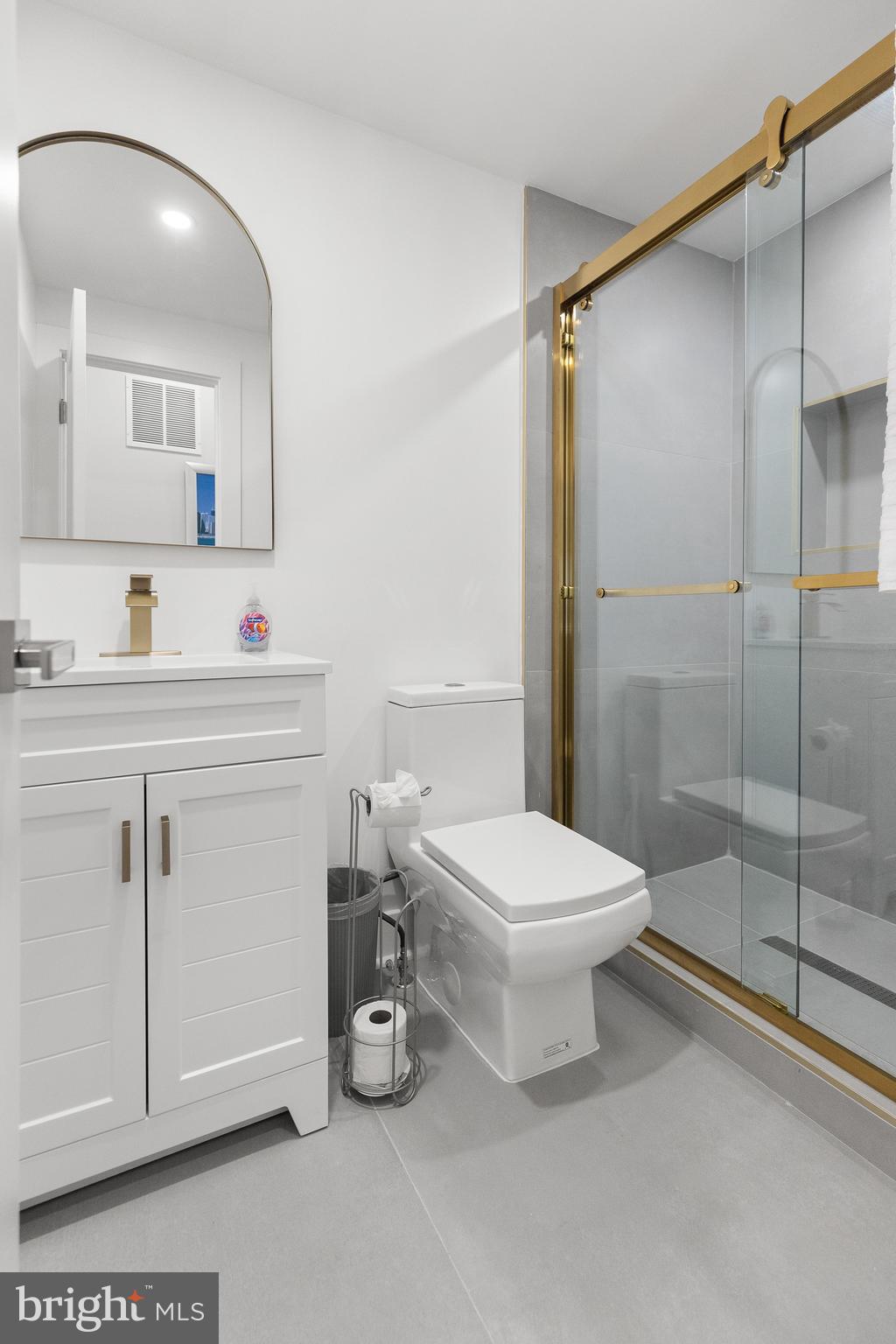 2918 17th Street South Arlington, VA 22204 - Photo 24 of 30 a bathroom with a sink a toilet and shower