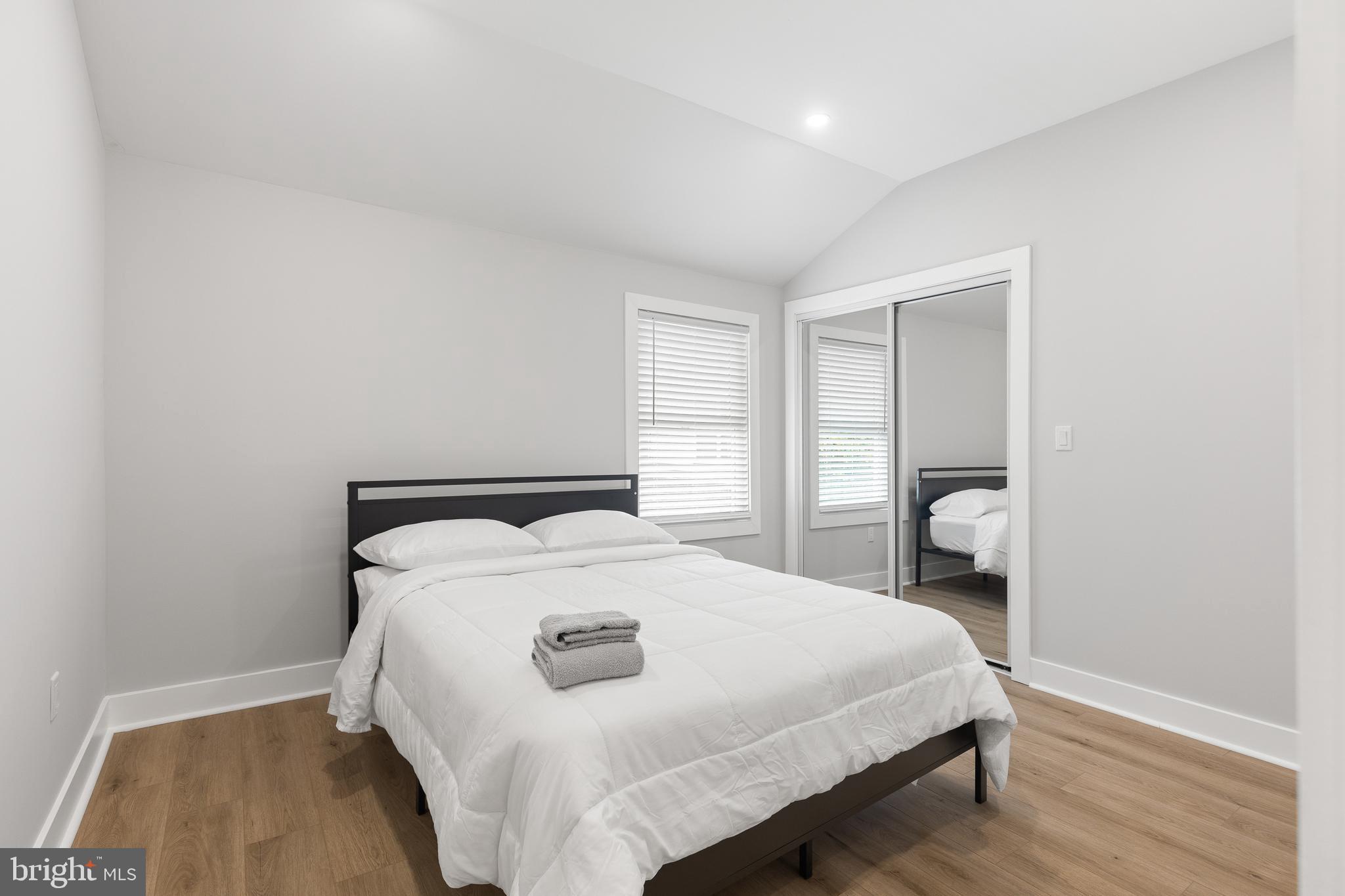 2918 17th Street South Arlington, VA 22204 - Photo 25 of 30 a bedroom with a bed and a table