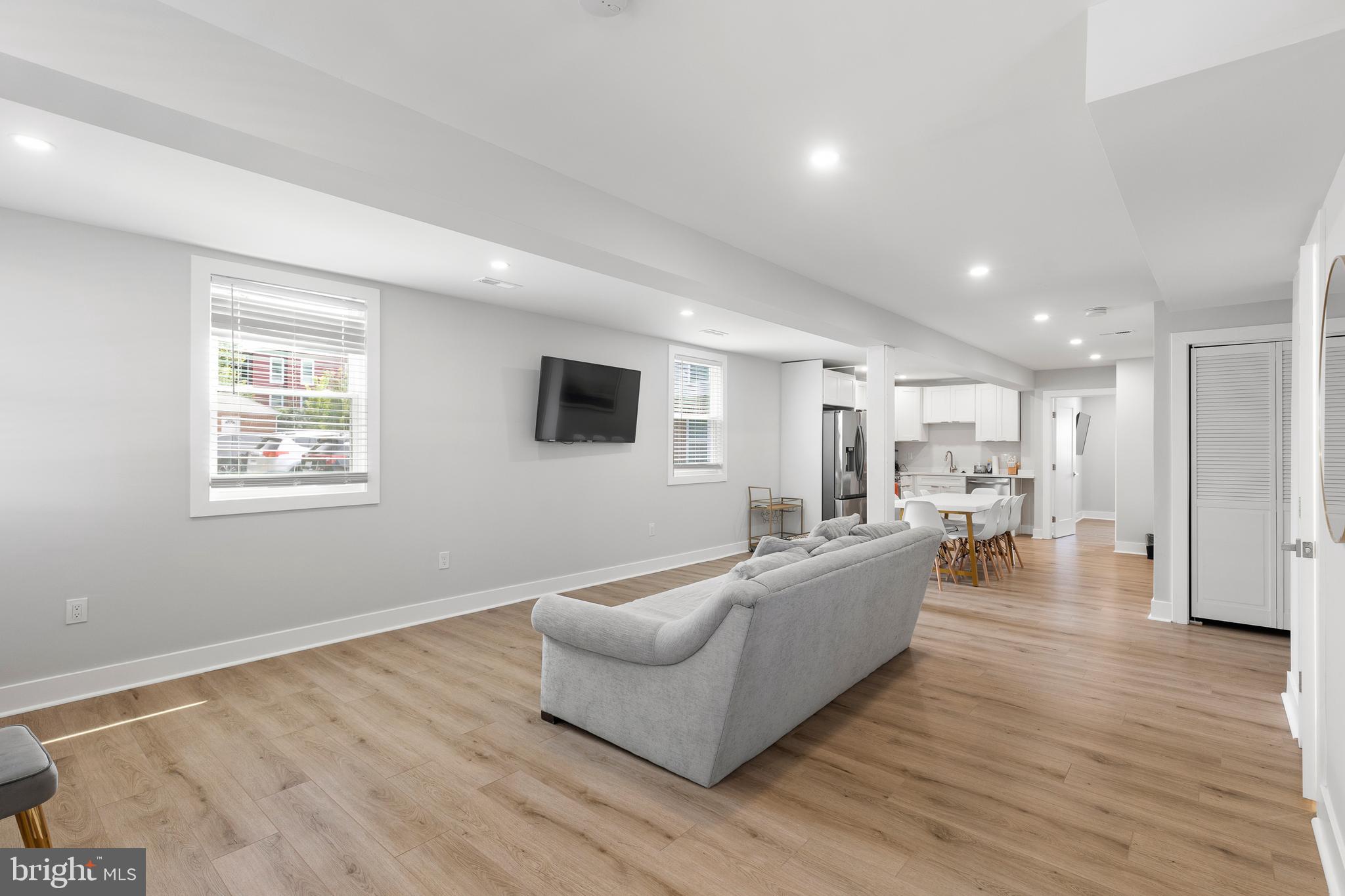 2918 17th Street South Arlington, VA 22204 - Photo 5 of 30 a living room with furniture and a wooden floor