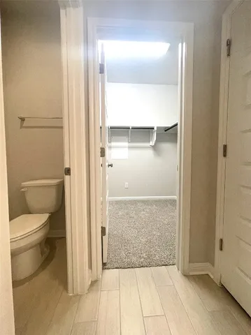 a bathroom with a double vanity sink and mirror