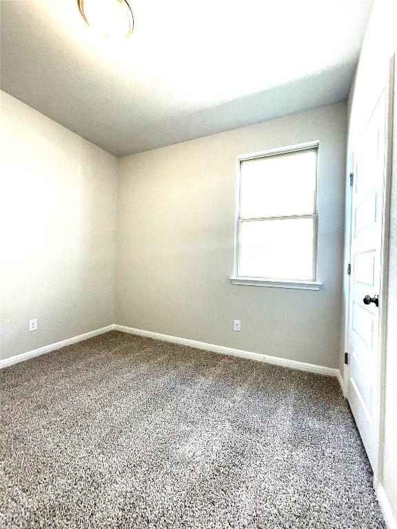 121 Old Stagecoach Road Jarrell, TX 76537 - Photo 19 of 23 an empty room with a window