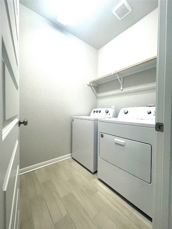 121 Old Stagecoach Road Jarrell, TX 76537 - Photo 20 of 23 a utility room with dryer and washer