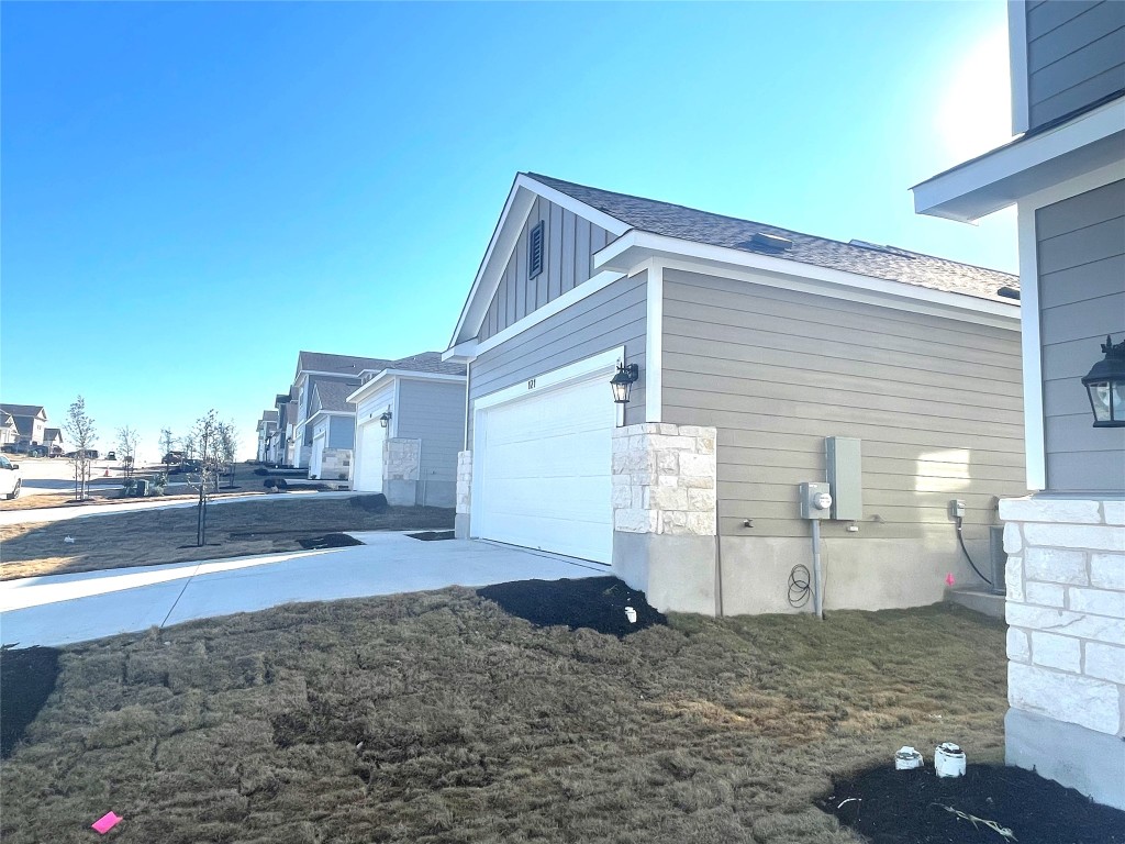 121 Old Stagecoach Road Jarrell, TX 76537 - Photo 4 of 23 a view of a house with a backyard