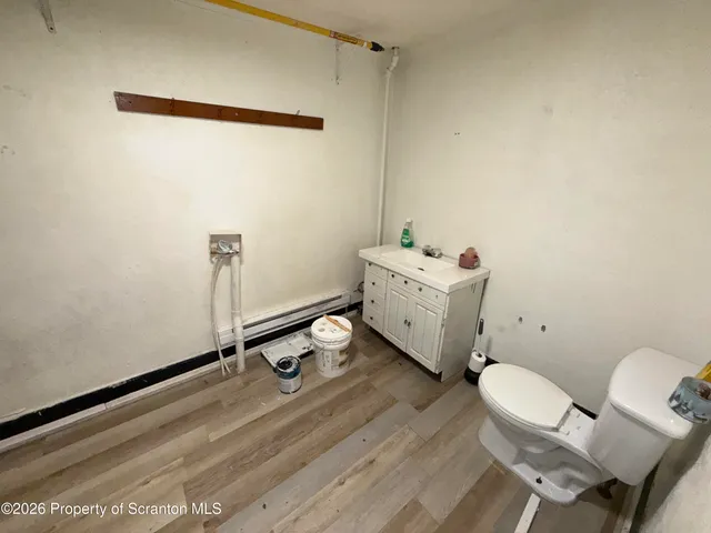 a view of workspace with wooden floor