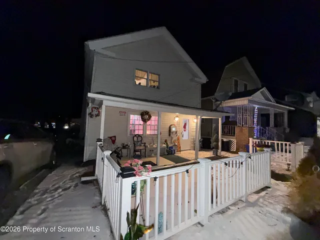 a view of a building with sitting area