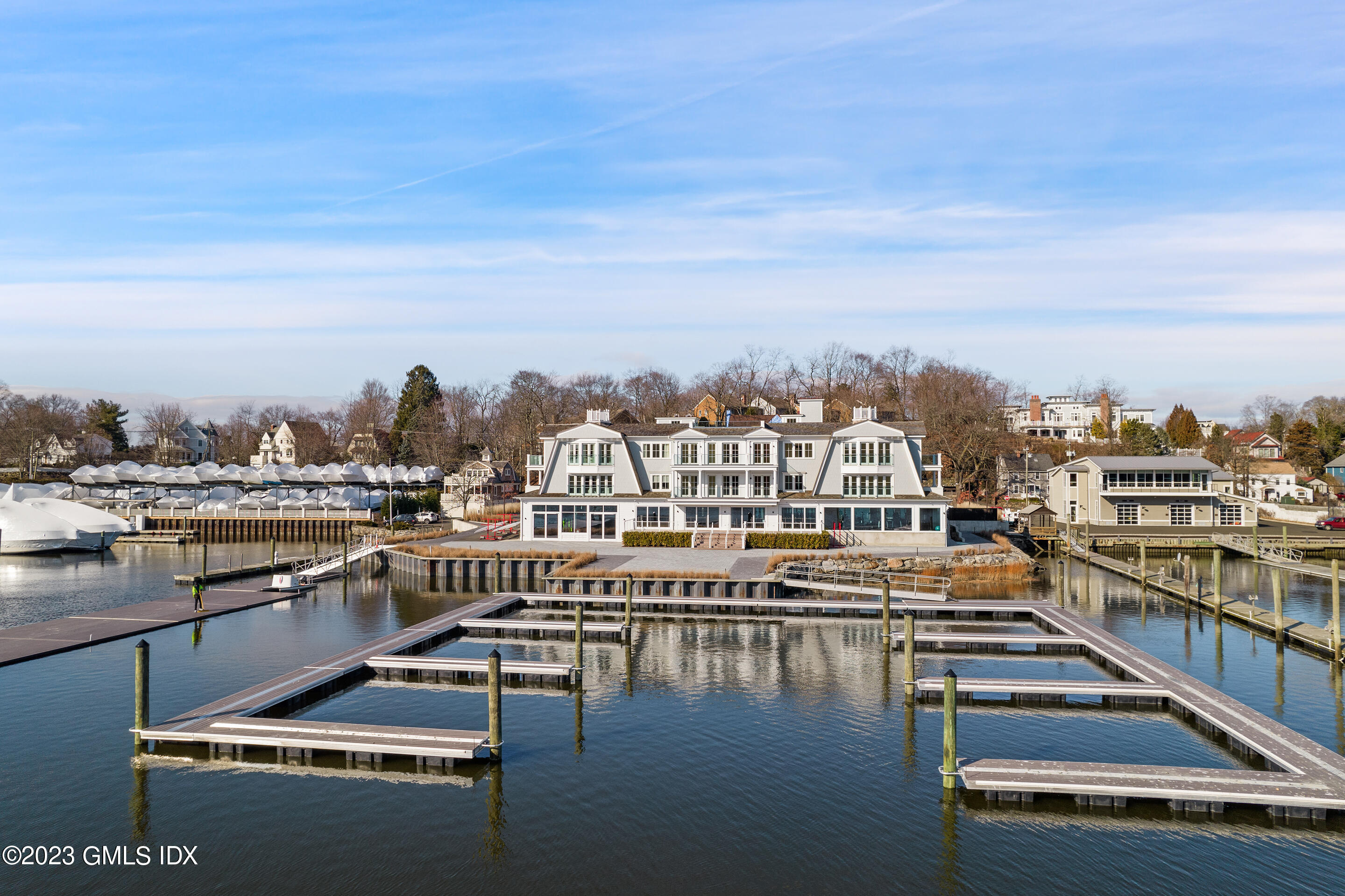 89 River Road, Unit 203 Cos Cob, CT 06807 - Photo 16 of 17 a view of a city with lawn chairs