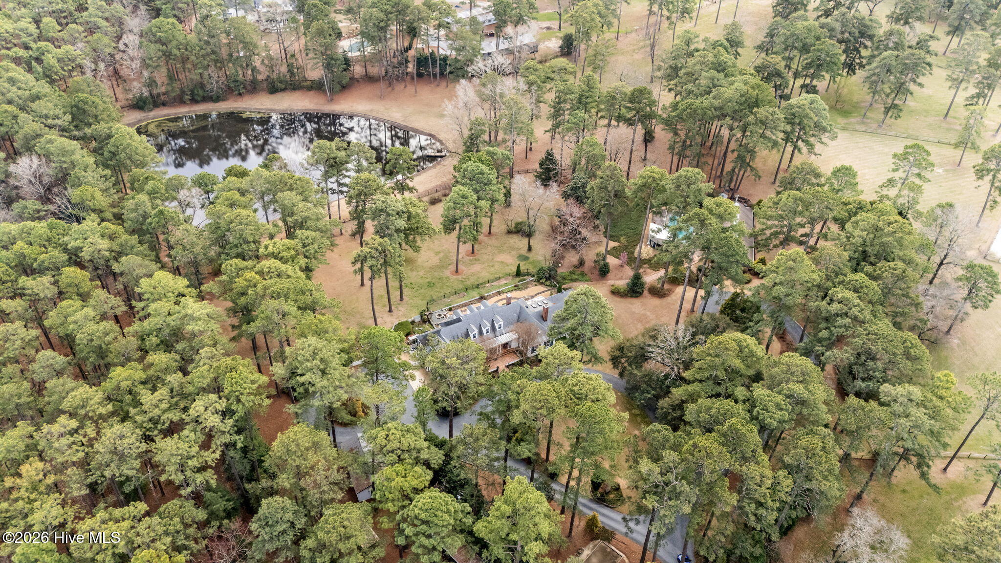 667 Yadkin Road Southern Pines, NC 28387 - Photo 7 of 74 89-web-or-mls-DJI_20240403152859_0733_D