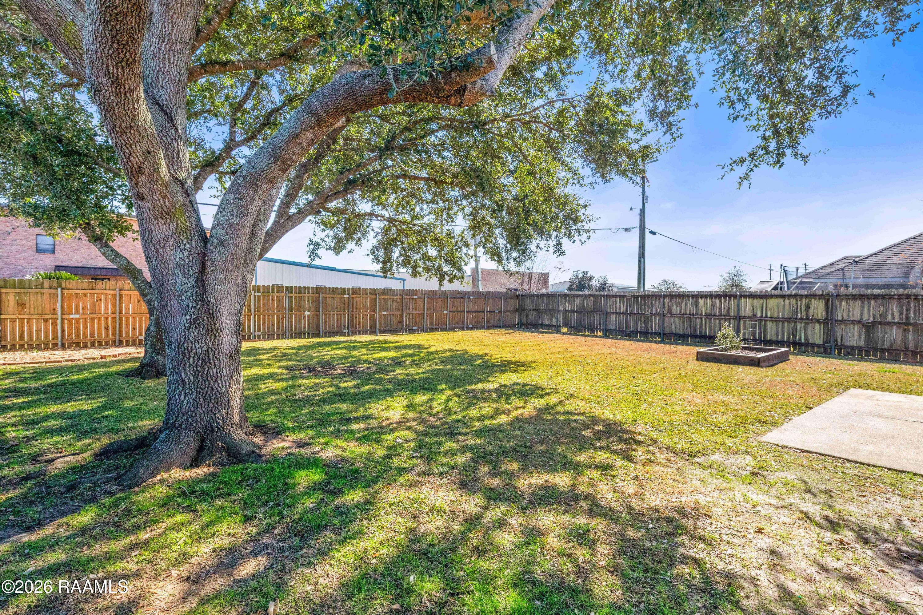 102 Pear Tree Circle Broussard, LA 70518 - Photo 27 of 28 Large fenced-in yard