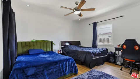 a bed room with a bed and furniture