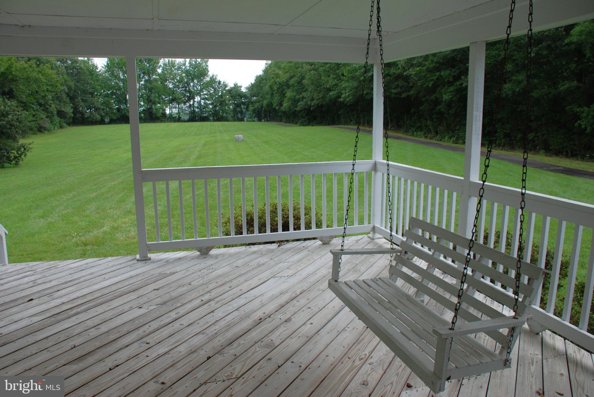 4508 Lewiston Road Bumpass, VA 23024 - Photo 6 of 84 Serene porch with a swing and view.